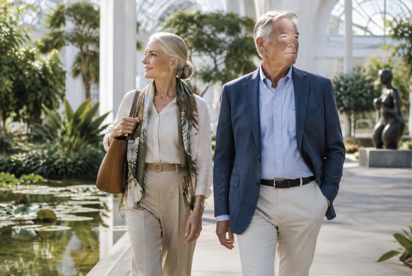 A retired couple enjoying a purposeful day in a bright botanical setting